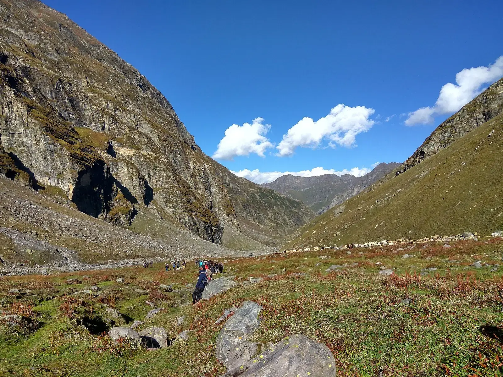 A trekker in the valley on the way to Hampta Pass