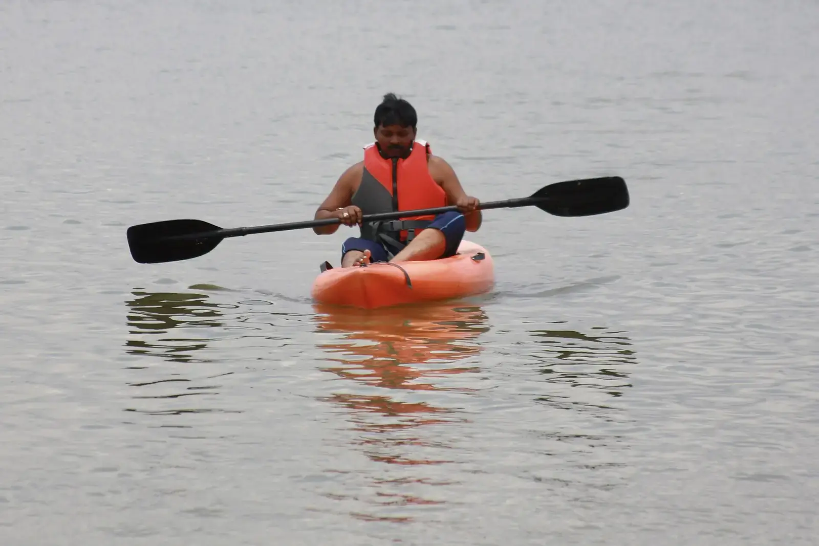 A kayaker paddling on Kotpally reservoir, Telangana