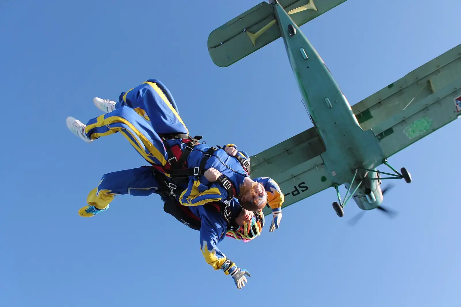 Tandem skydivers in free fall just after leaving the aircraft