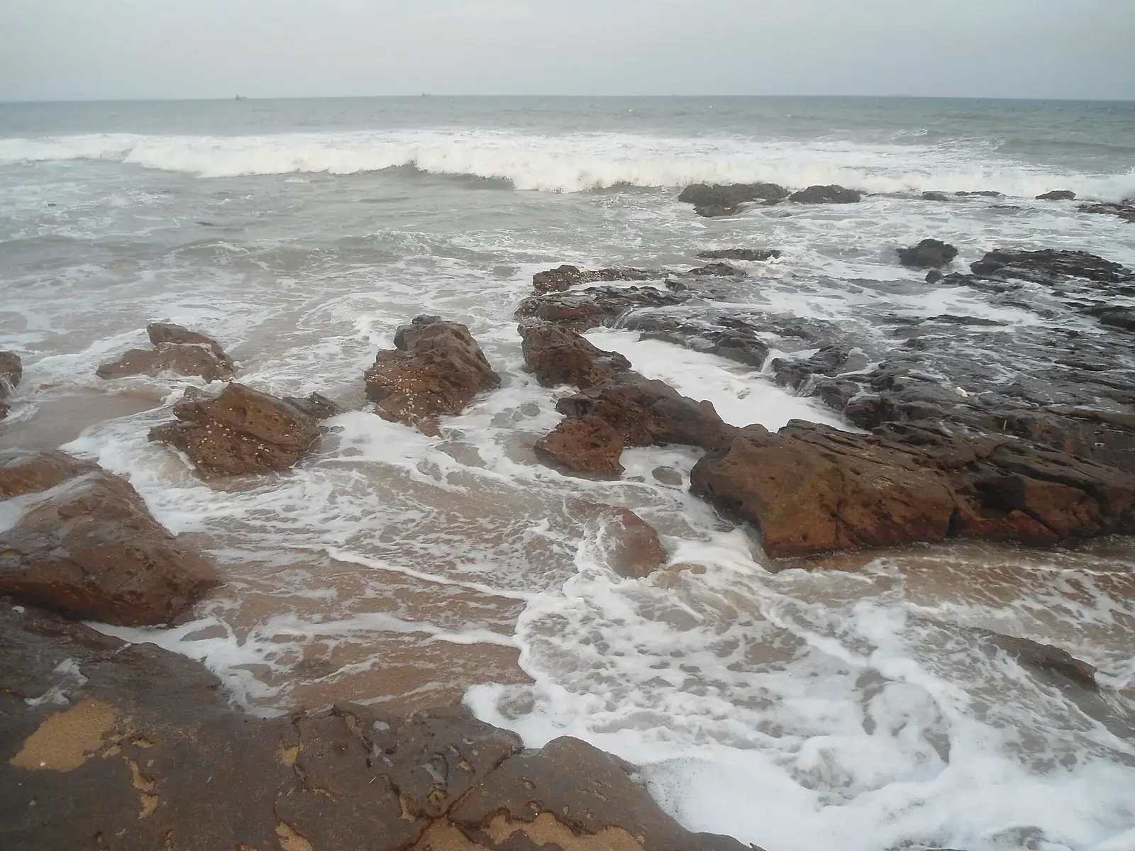 Rocks and surf at Rushikonda beach, Visakhapatnam