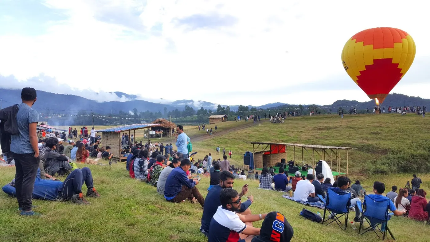 Crowd gathered at the day stage of the Ziro Music Festival held on open paddy fields