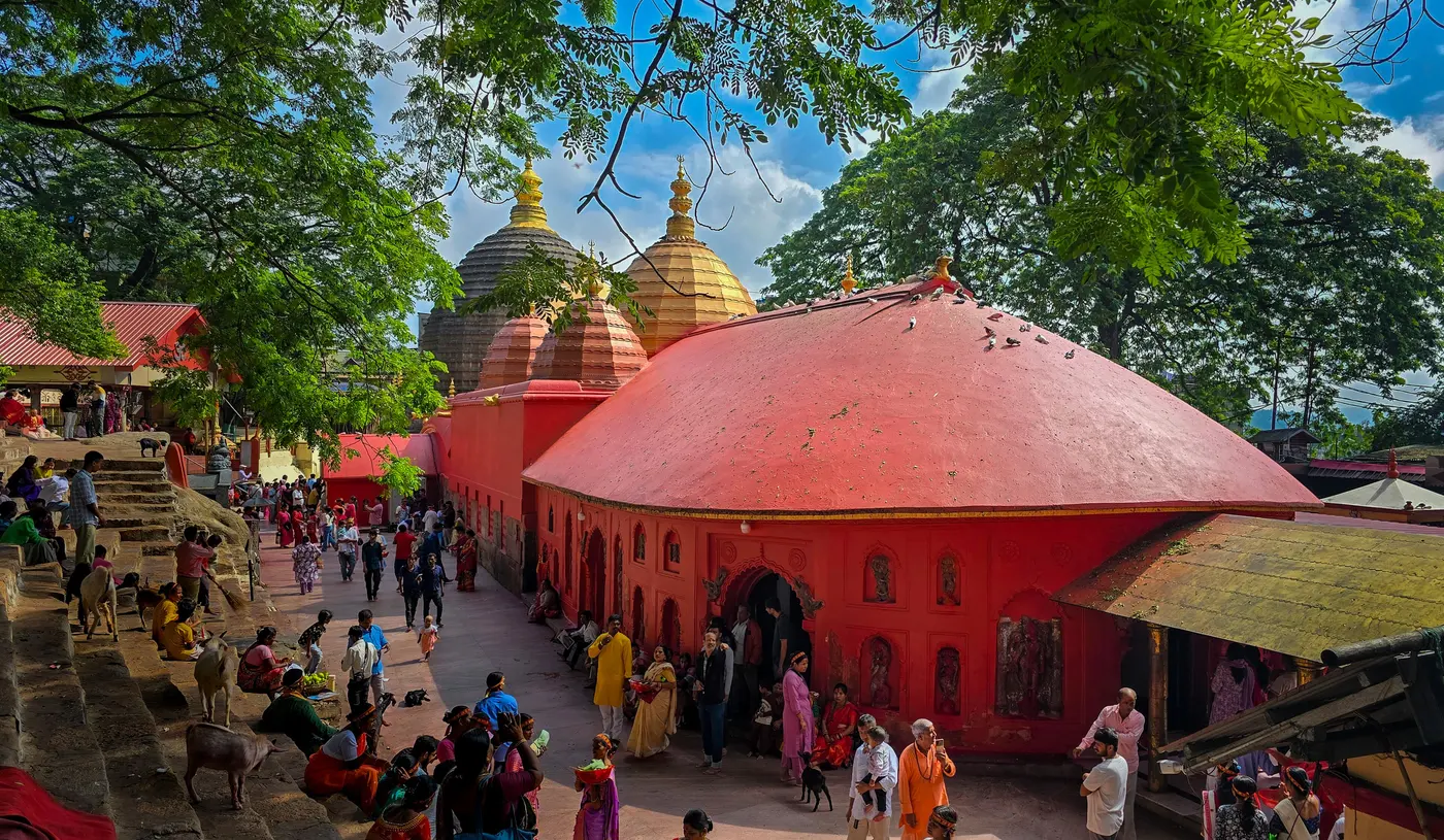The distinctive red beehive-shaped shikhara of Kamakhya Temple in Guwahati