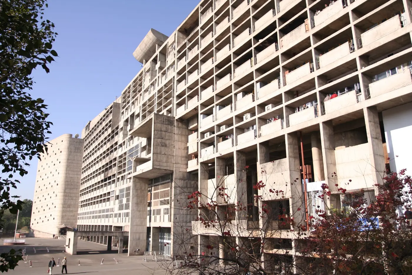 The Secretariat's long, repeating raw-concrete facade of sun-breaker grids at Capitol Complex, Chandigarh