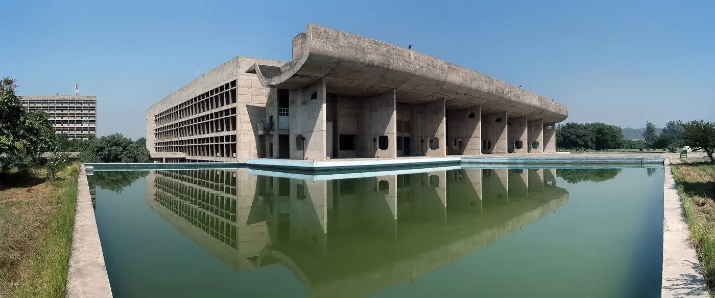 The Vidhan Sabha (Legislative Assembly) building at Capitol Complex, Chandigarh, reflected in its foreground water pool