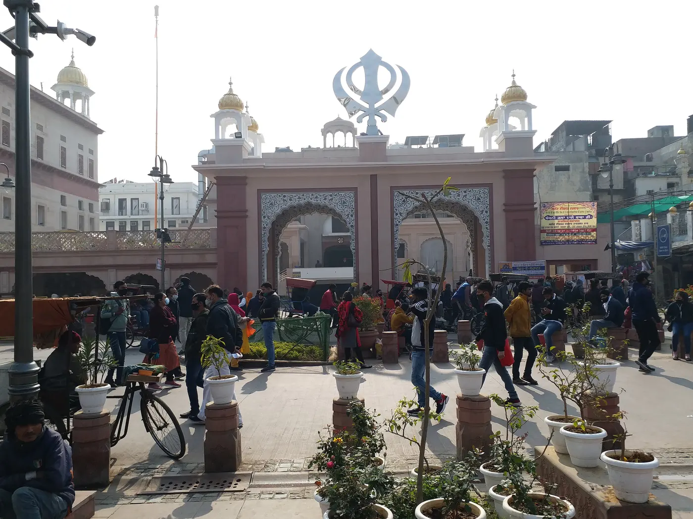 The golden-domed entrance gate of Gurudwara Sis Ganj Sahib on the Chandni Chowk road