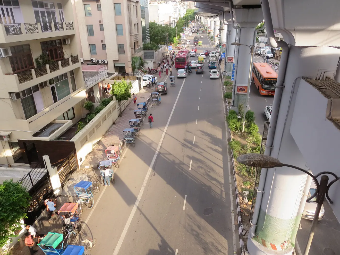 Tree-lined main road through the residential colony of Greater Kailash-1, South Delhi
