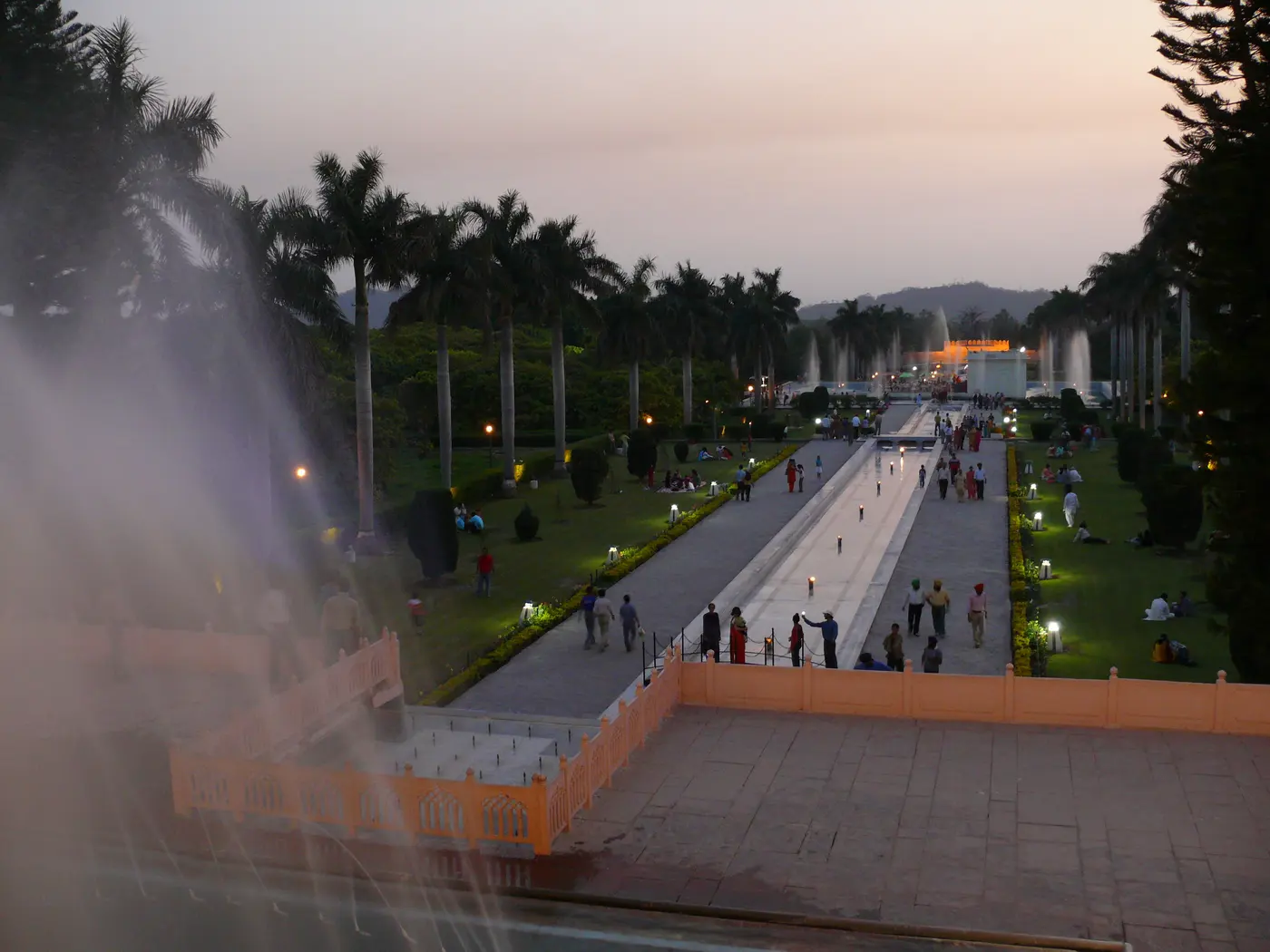 Yadavindra Gardens at Pinjore lit up at dusk, with its terraced fountains and Mughal-era pavilion