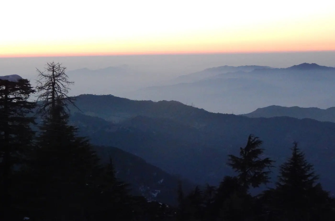 Layered hills and forest at sunset seen from the Netarhat plateau, Jharkhand