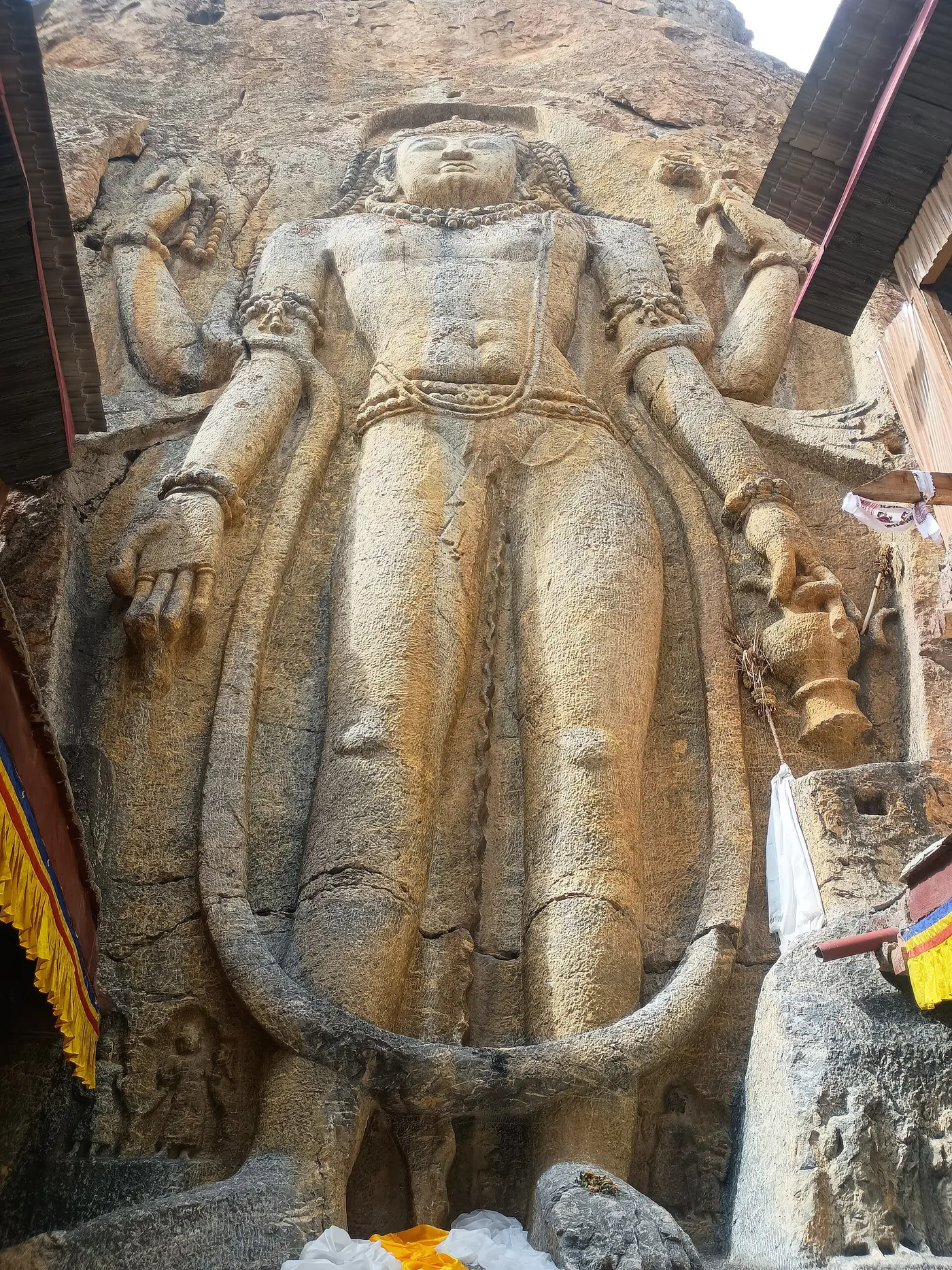 The roughly 9-metre rock-cut Chamba (Maitreya Buddha) statue carved into the cliff face at Mulbekh, near Kargil