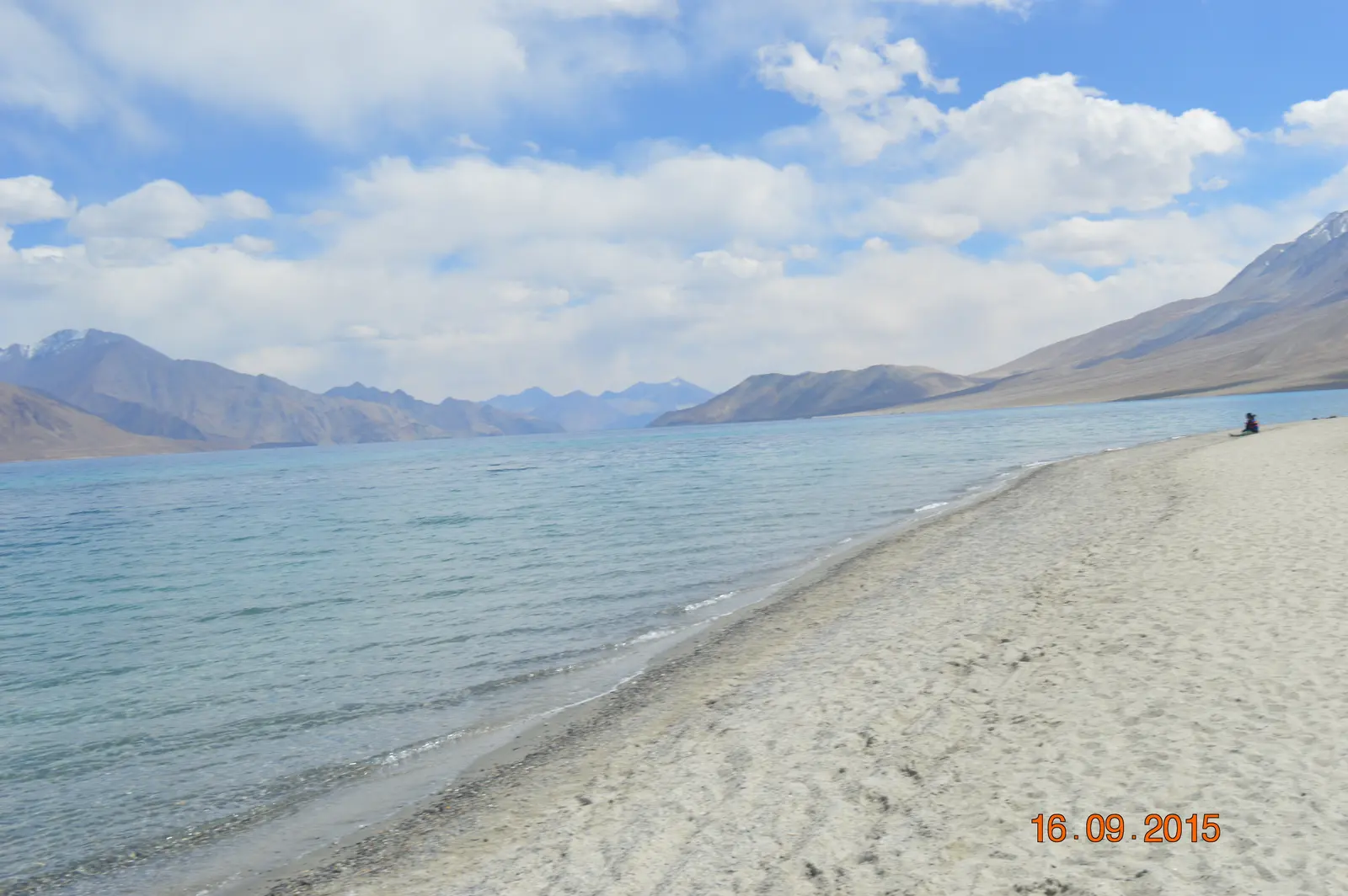 Shoreline of Pangong Tso with bands of blue water, Ladakh