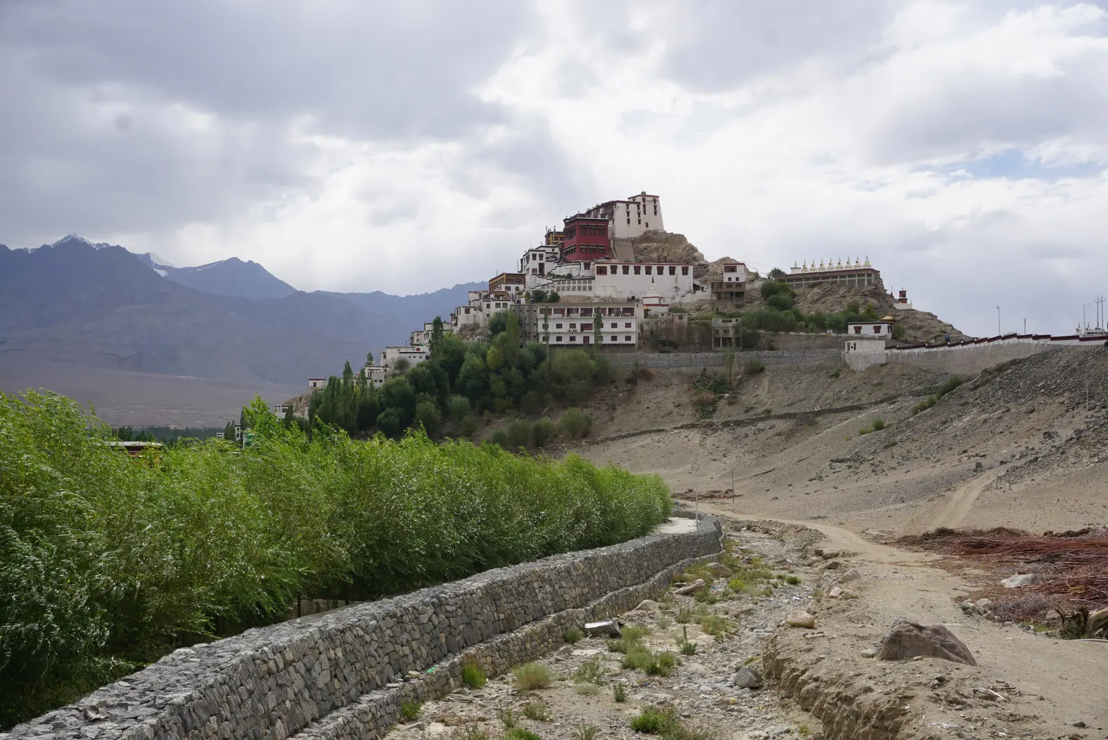 Thiksey Monastery's tiered, Potala-like complex crowning its hilltop above the Indus valley, Ladakh