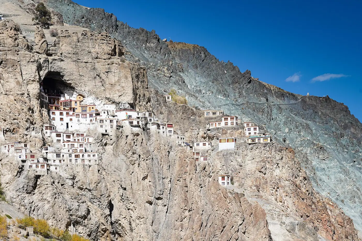Phugtal Monastery built into a sheer cliff face above the Tsarap River, Zanskar Valley
