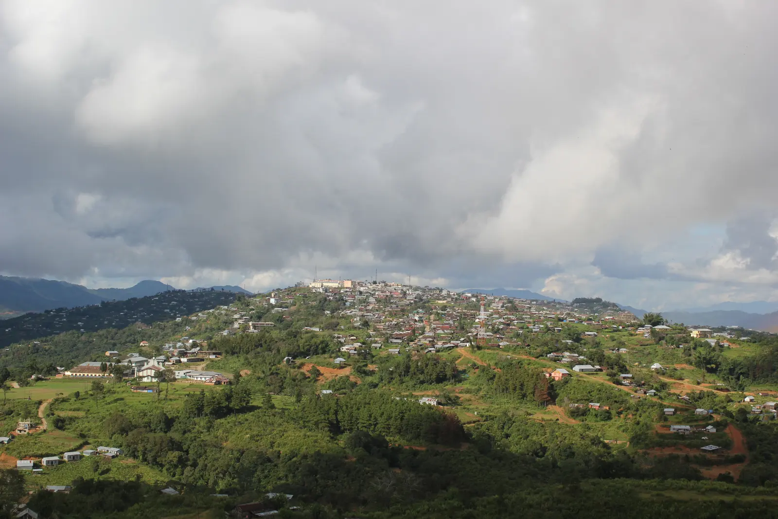 Ukhrul town spread across the Tangkhul hills under a monsoon sky, Manipur