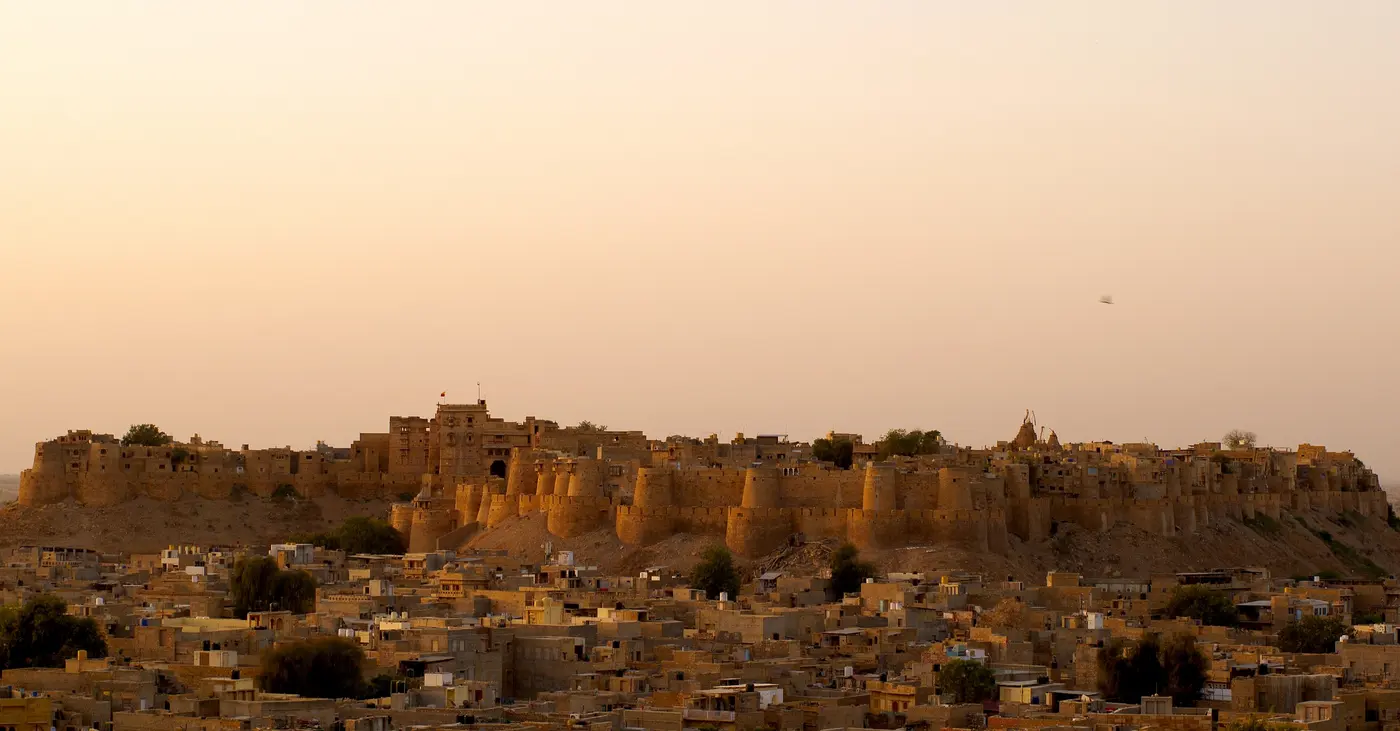 Sandstone walls of Jaisalmer Fort glowing at sunrise, Rajasthan