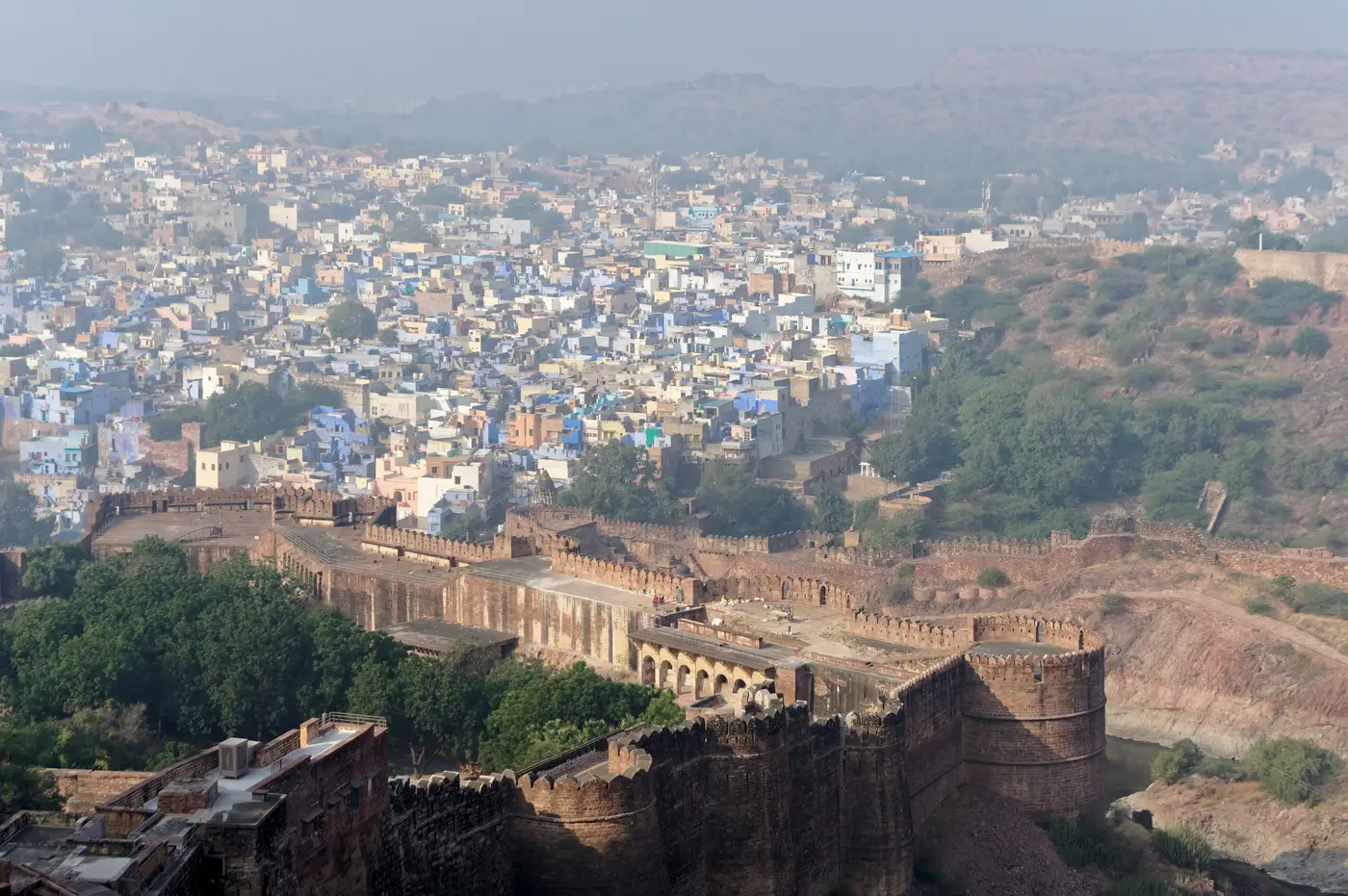 Mehrangarh Fort above the blue-painted houses of Jodhpur, Rajasthan