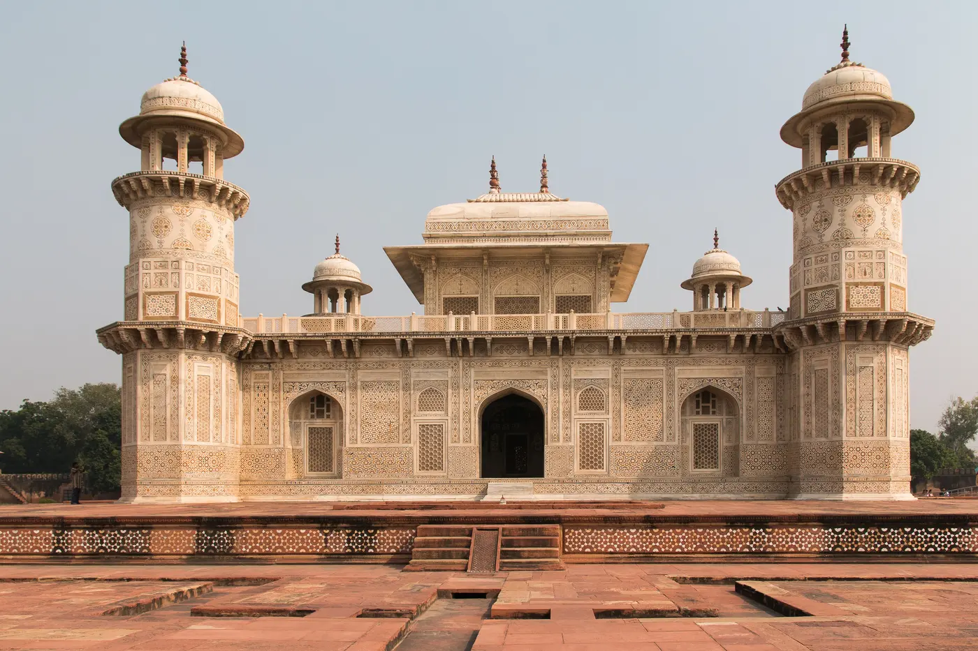 The white marble facade and four corner minarets of Itmad-ud-Daulah's tomb, the 'Baby Taj', Agra