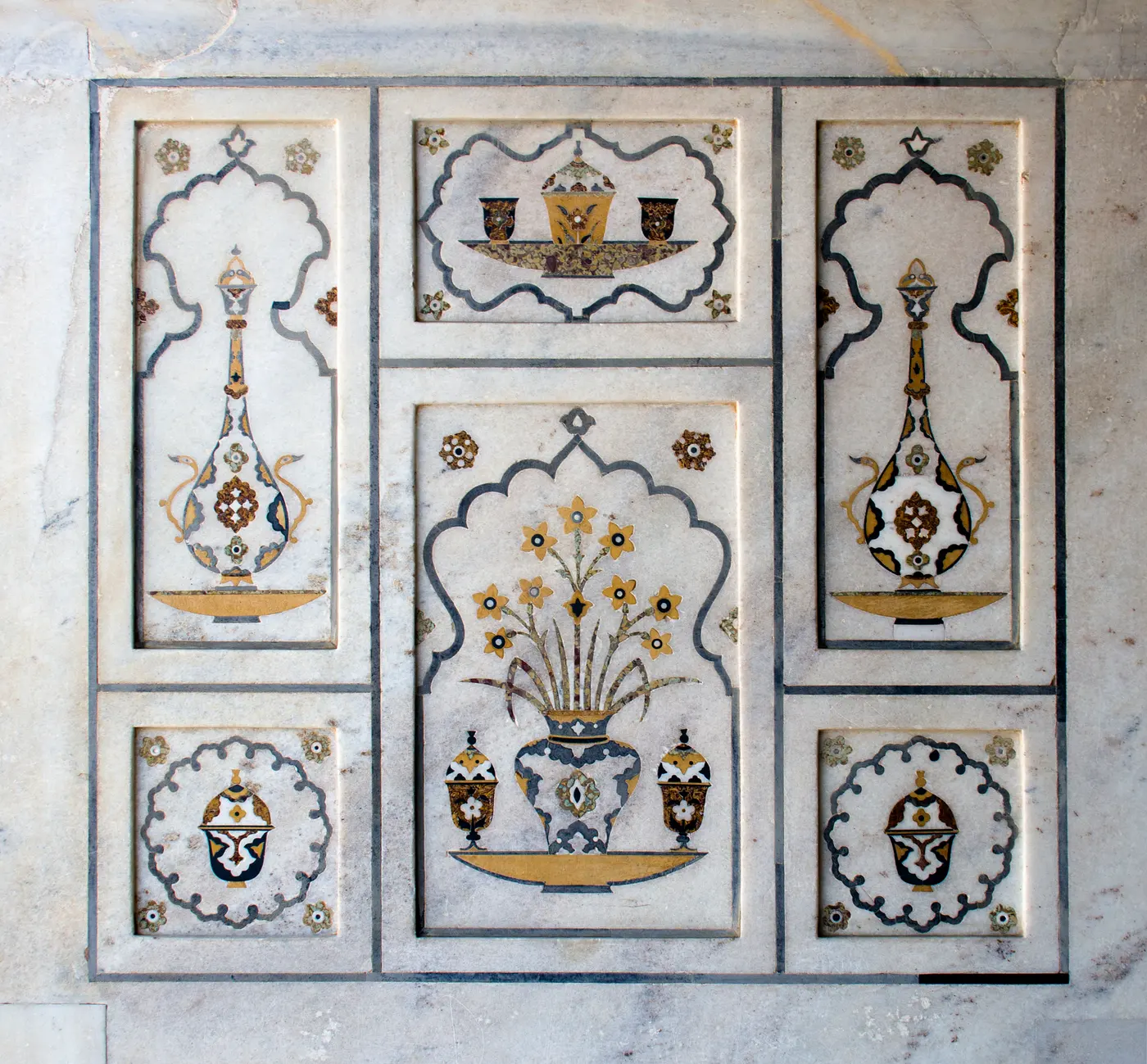 Close-up of geometric pietra dura marble-inlay stonework, the technique Agra's artisans still practice today