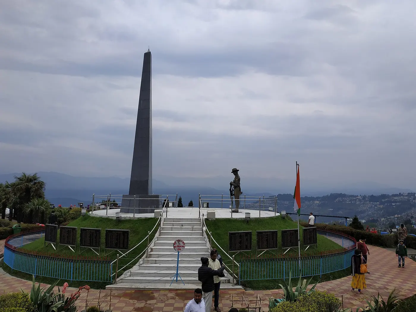 The Gorkha war memorial obelisk and soldier statue at the centre of the Batasia Loop, Darjeeling