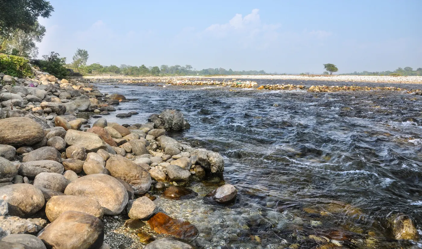 The rocky, boulder-strewn bed of the Murti river near Lataguri, a popular riverside picnic spot in the Dooars