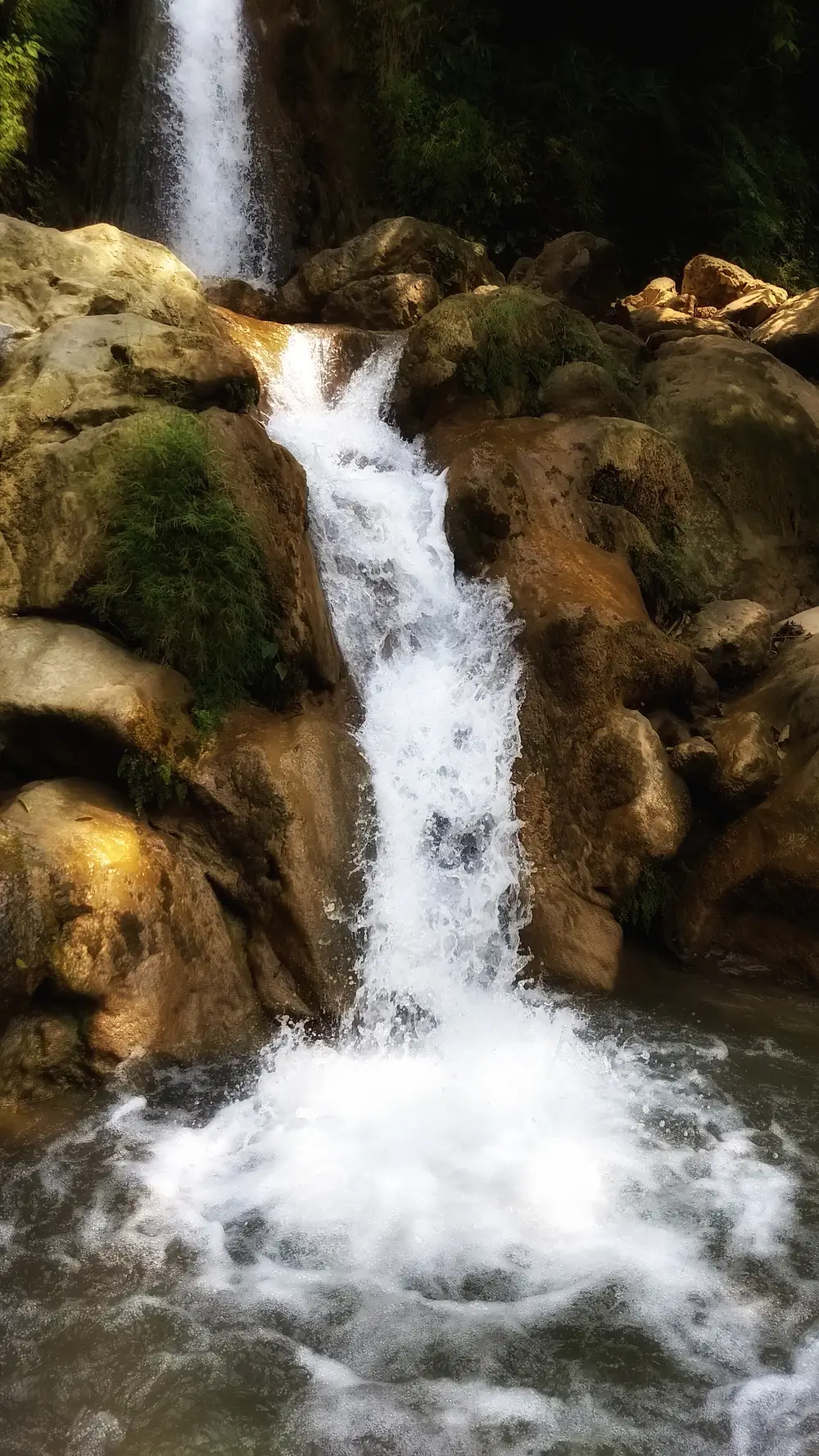 Neer Garh Waterfall cascading over rocks near Laxman Jhula, Rishikesh