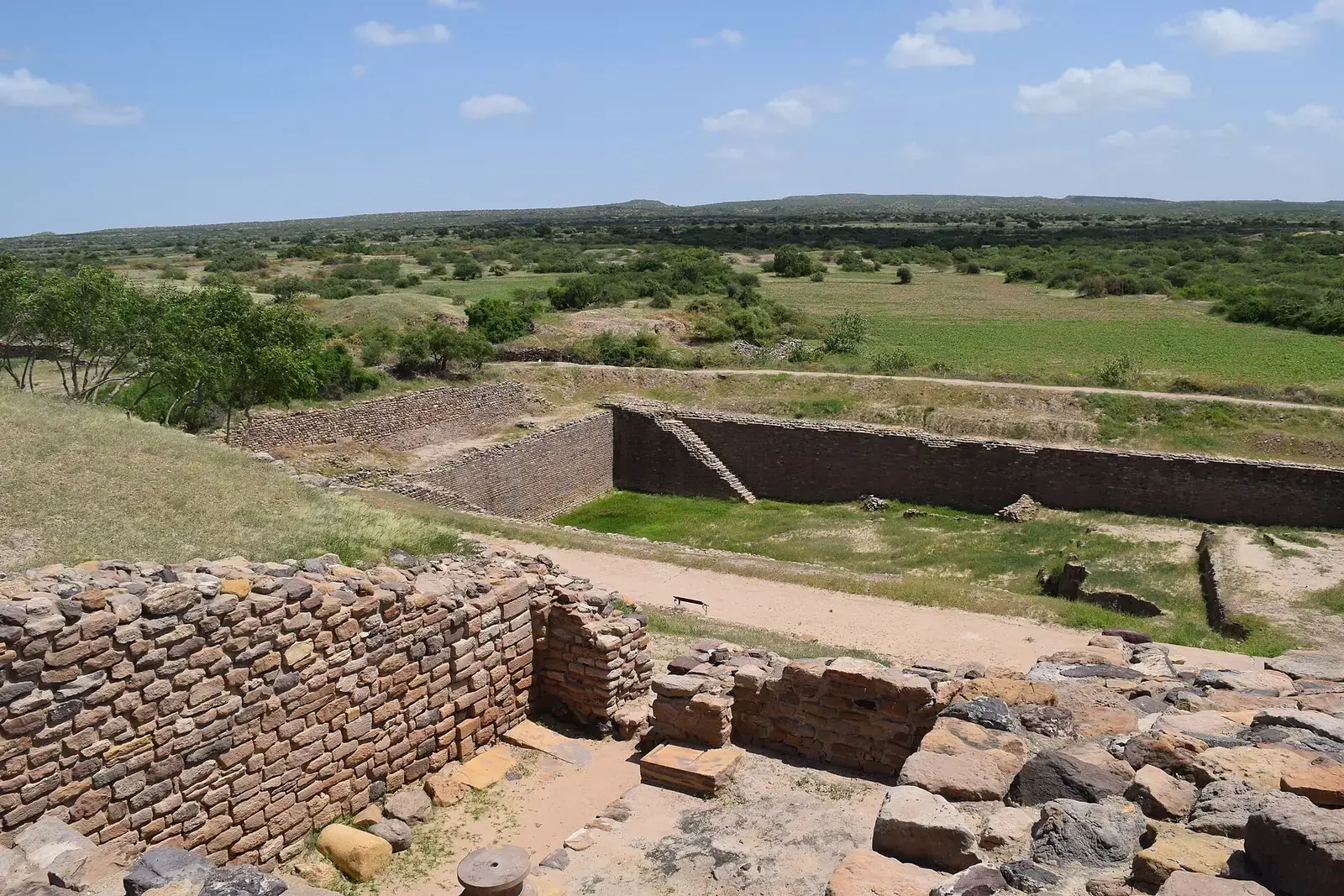 Excavated stone reservoirs and walls at Dholavira, Kutch