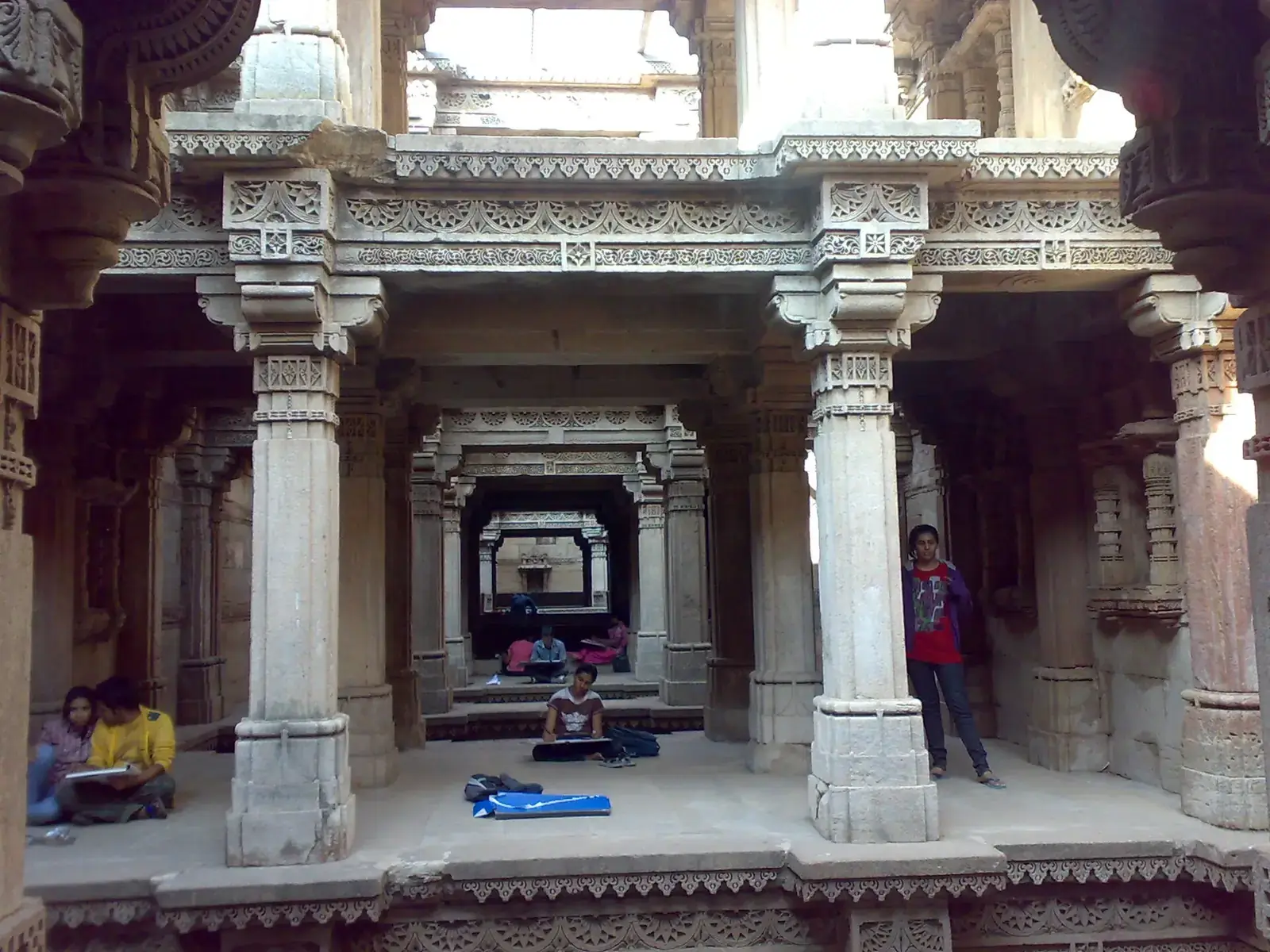 Carved pillars and galleries of the Adalaj stepwell near Ahmedabad