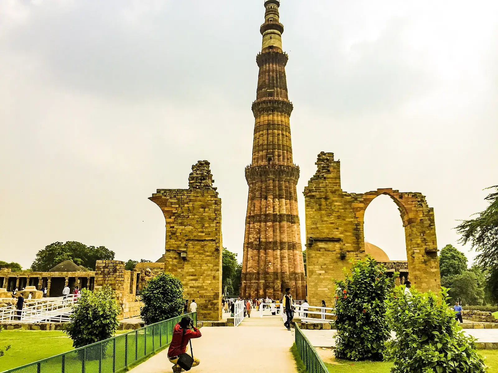 The Qutub Minar rising above the ruins of the Qutub complex, Delhi