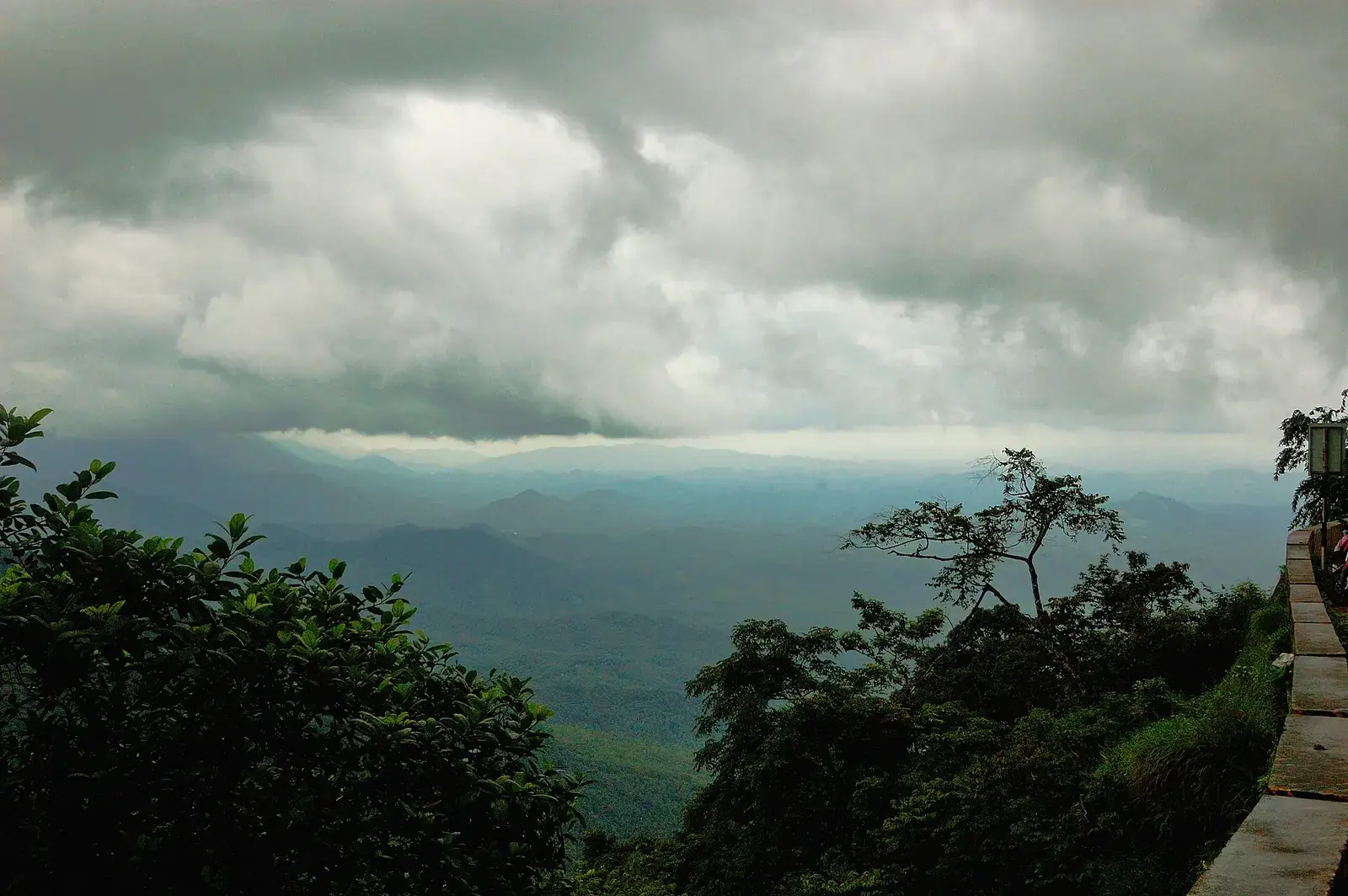 Forested ghats of Wayanad under monsoon clouds, Kerala