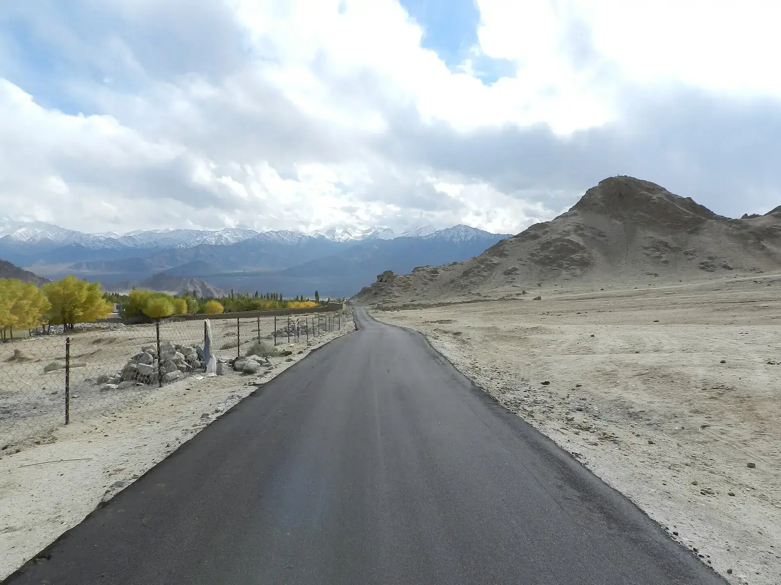 An empty road through the mountains near Leh, Ladakh