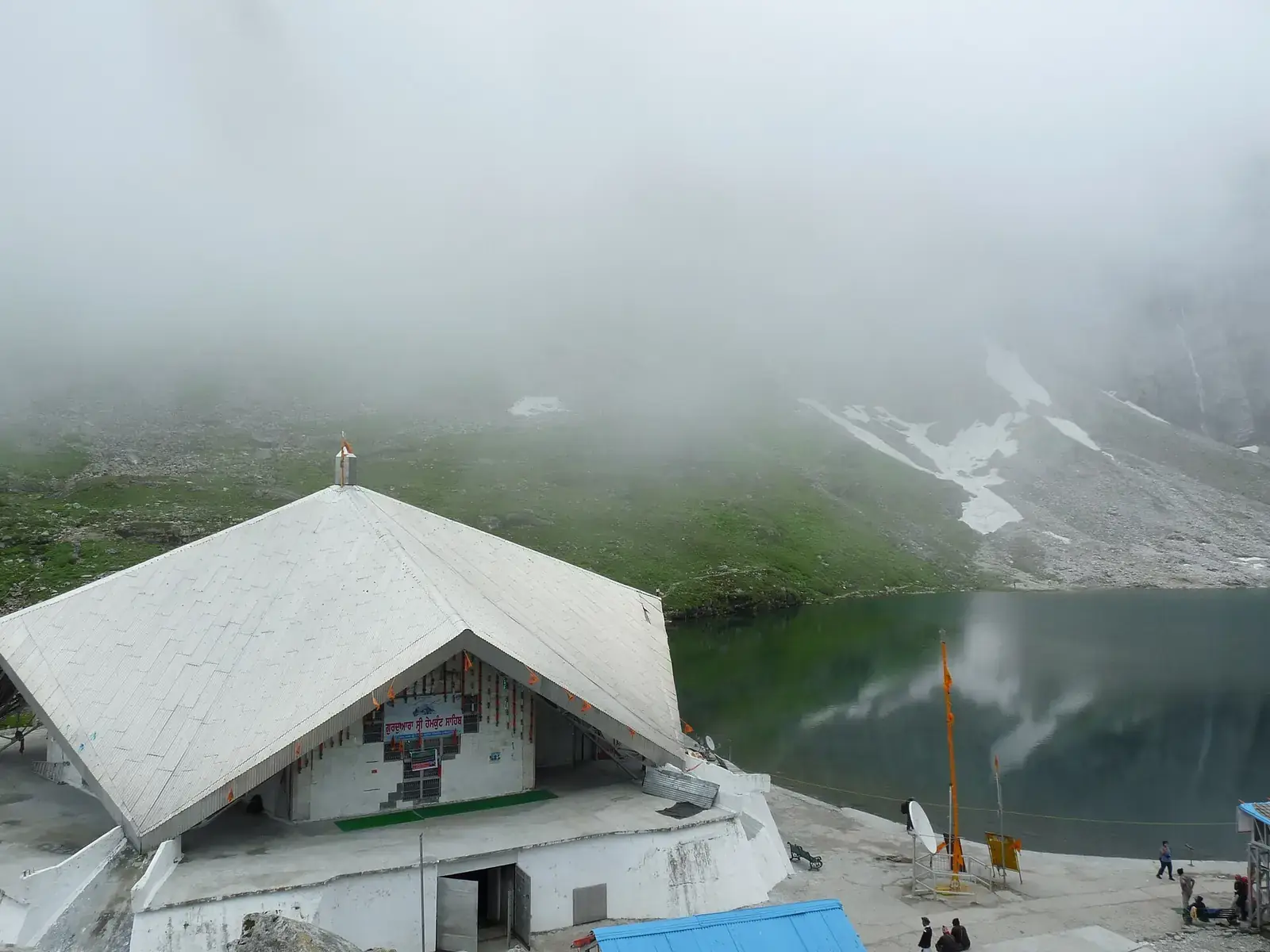 Gurdwara Hemkund Sahib beside the glacial lake in mist, Uttarakhand