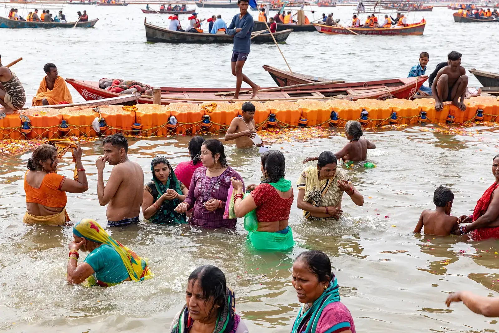 Pilgrims bathing at the Sangam during the 2019 Kumbh Mela at Prayagraj